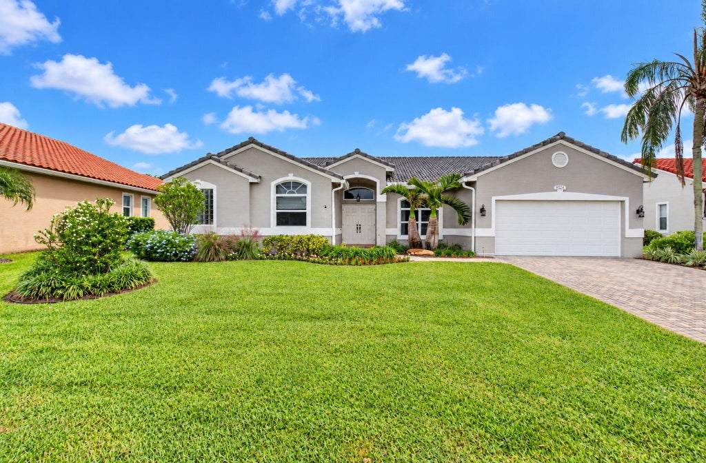 Photo of 9524 Lake Serena Drive, Boca Raton, FL 33496 (MLS # B26094511)