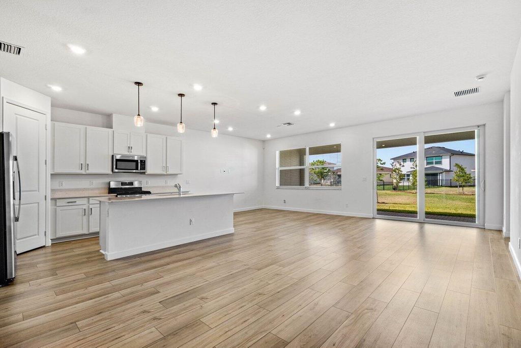 Photo of 1846 Wandering Willow Way, Loxahatchee, FL 33470 (MLS # R11109499)