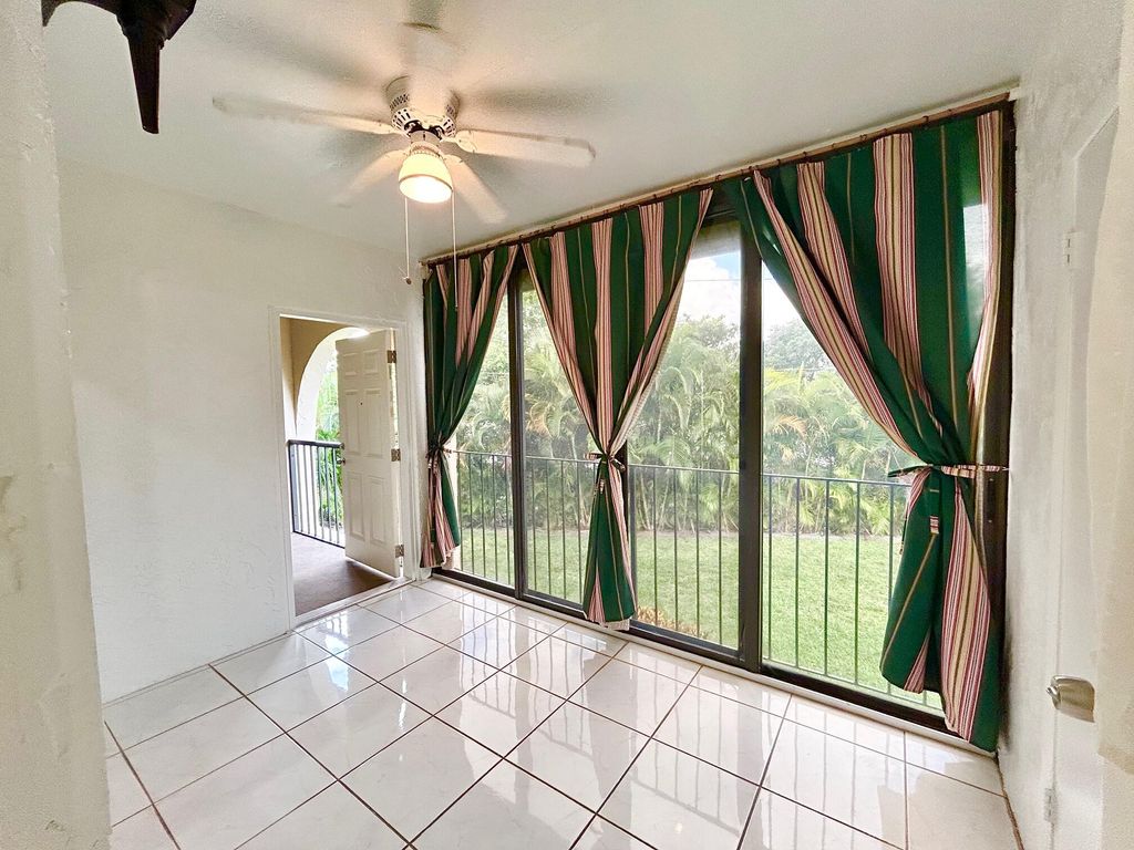 Photo of 433 Pine Glen Lane #C2, Greenacres, FL 33463 (MLS # B26038528)