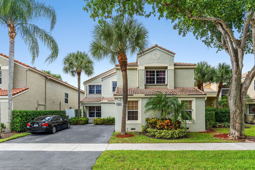 Photo of 7665 NW 61st Terrace, Parkland, FL 33067 (MLS # B26004007)