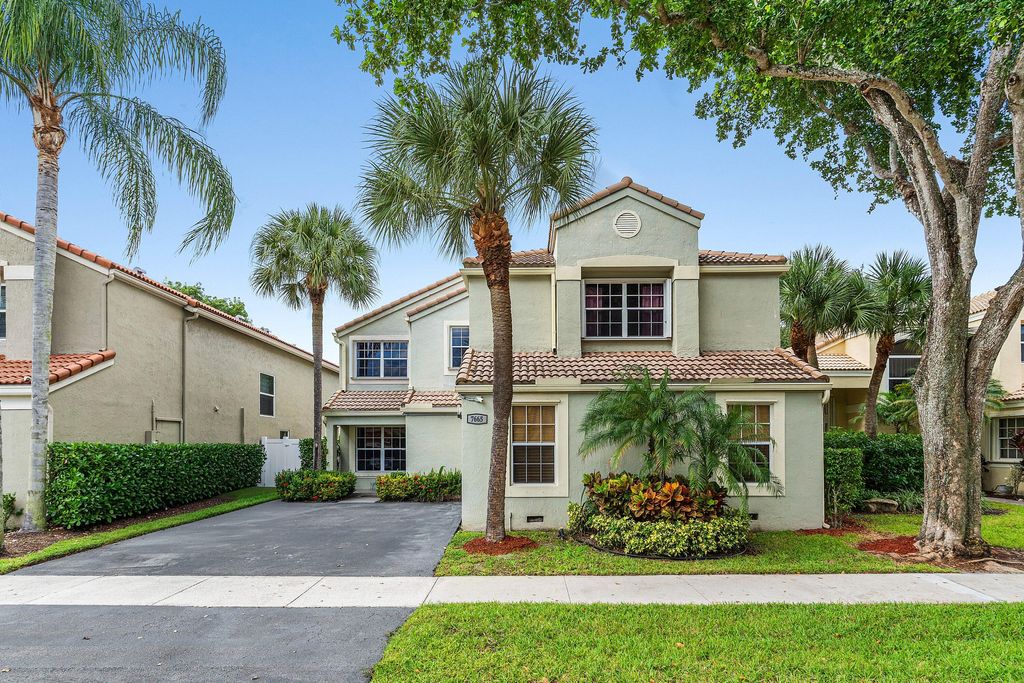 Photo of 7665 NW 61st Terrace, Parkland, FL 33067 (MLS # B26004007)