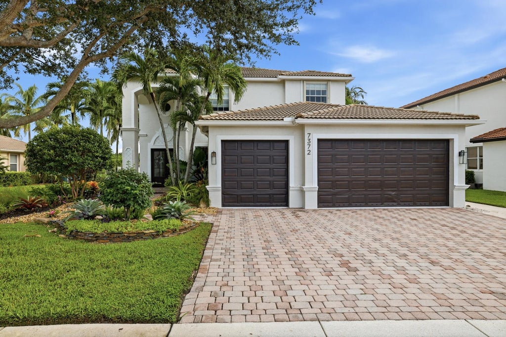 Photo of 7372 MONETA Street, Lake Worth, FL 33467 (MLS # B26086097)