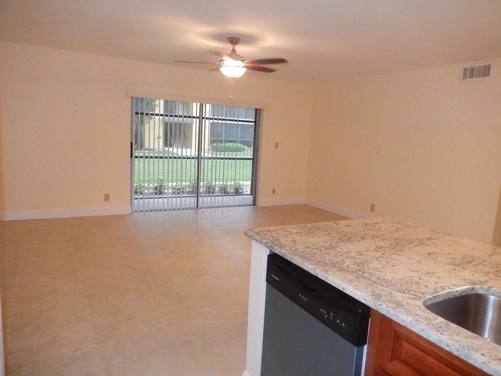 Photo of 3017 N Oakland Forest Drive #106, Oakland Park, FL 33309 (MLS # B26025493)