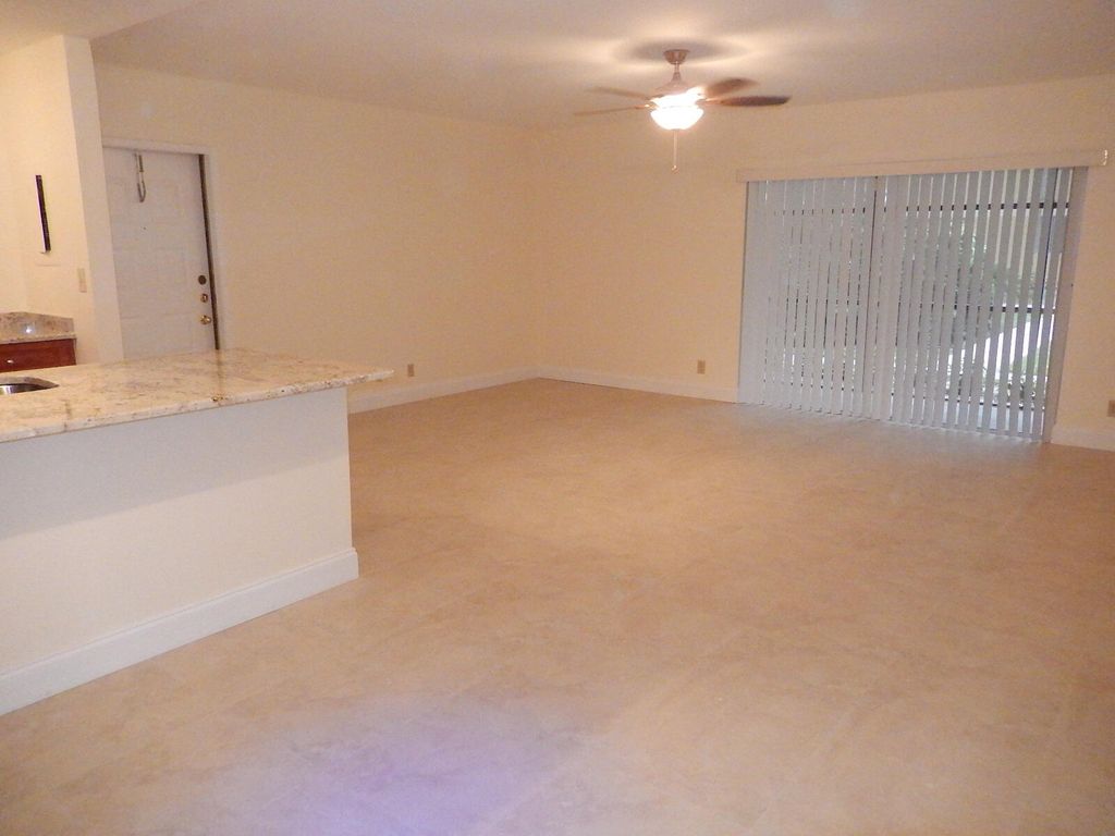 Photo of 3017 N Oakland Forest Drive #106, Oakland Park, FL 33309 (MLS # B26025493)