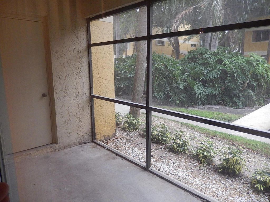 Photo of 3017 N Oakland Forest Drive #106, Oakland Park, FL 33309 (MLS # B26025493)