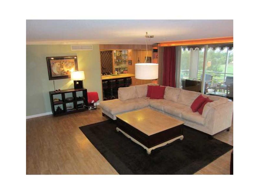 Spacious, updated custom double penthouse in East Boca Raton with 3 bedrooms and 3 bathrooms, open floor plan with large patio overlooking the golf course. Split floor plan with 2 master suites, both with walk-in closets. Main master suite is 460 sqft wi th a large modern master bathroom with his & hers sinks and a separate shower room. Perfect for entertainment with custom cabinetry and a built-in bar in the living/dining room. Eat-in kitchen, separate full size laundry, dual zone AC. All Ages Building.