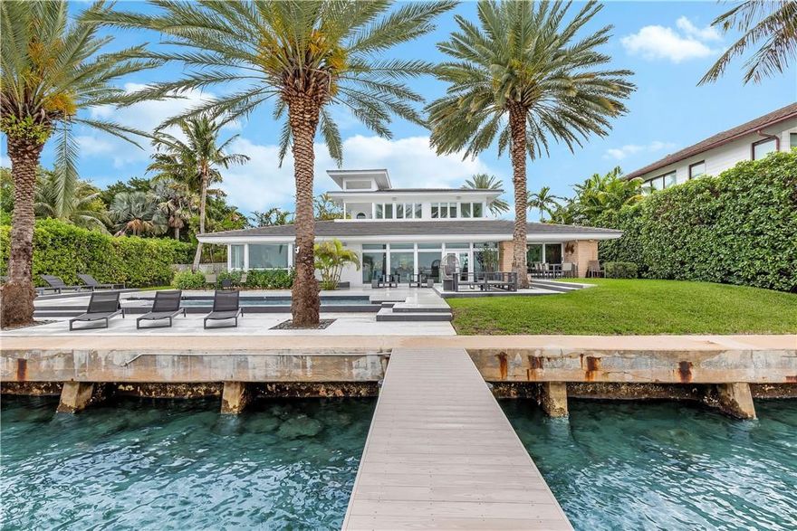 Panoramic sunset and open water views in Miami Beach with 95 feet of Biscayne Bay frontage! Oversized 16.318 square foot lot in the gated Normandy Shores community. Updated with modern finishes, this home features 5 bedrooms and 5.5 baths, wide open living and entertaining with oversized island in kitchen, travertine marble floors, saltwater pool with slate tile patio, dock and 33,000 pound boat lift. Enjoy this peaceful gated community with golf course, tennis courts, playgrounds, outdoor gyms and serene landscapes.