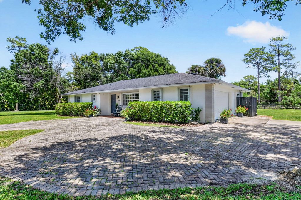Photo of 14964 Snail Trail, Loxahatchee Groves, FL 33470 (MLS # B26022091)