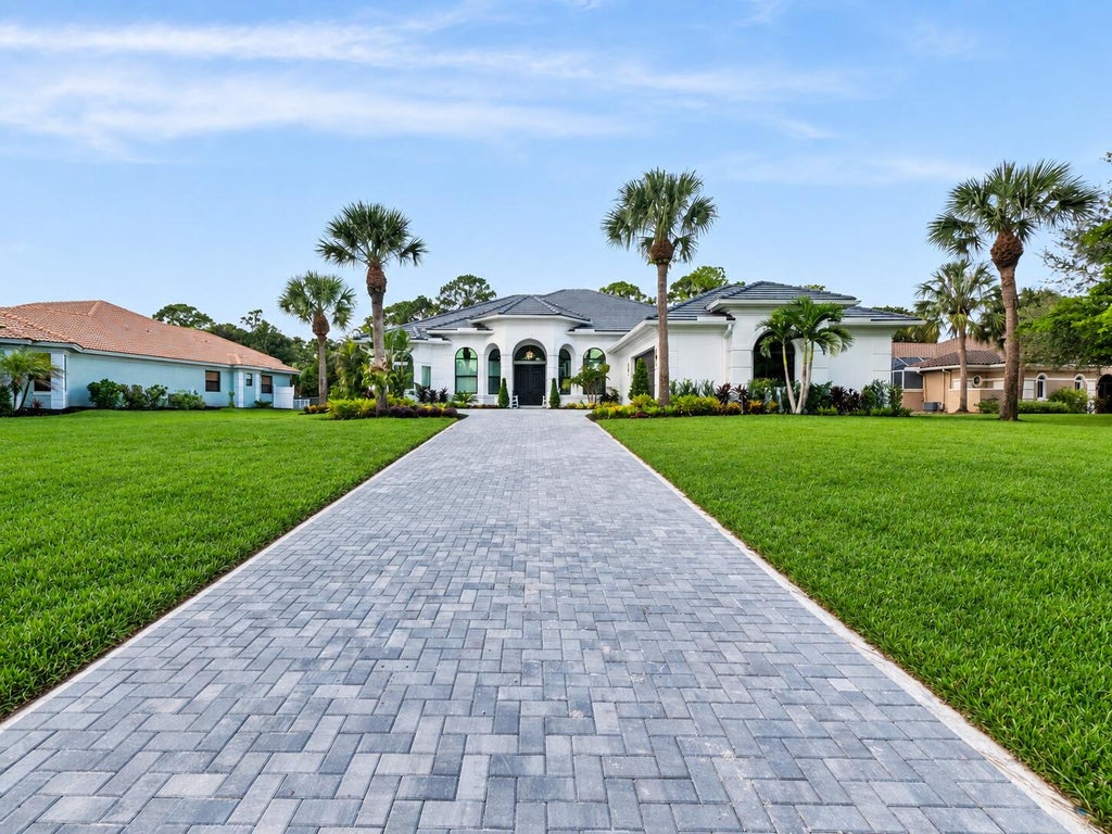 Photo of 1608 SW CATTAIL Court, Palm City, FL 34990 (MLS # B26076951)