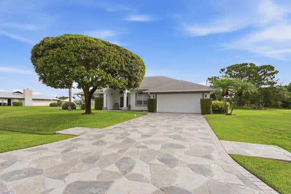 Photo of 2201 SE BOWIE Street, Port Saint Lucie, FL 34952 (MLS # B26057783)
