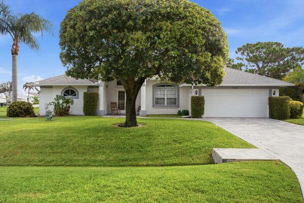 Photo of 2201 SE BOWIE Street, Port Saint Lucie, FL 34952 (MLS # B26057783)