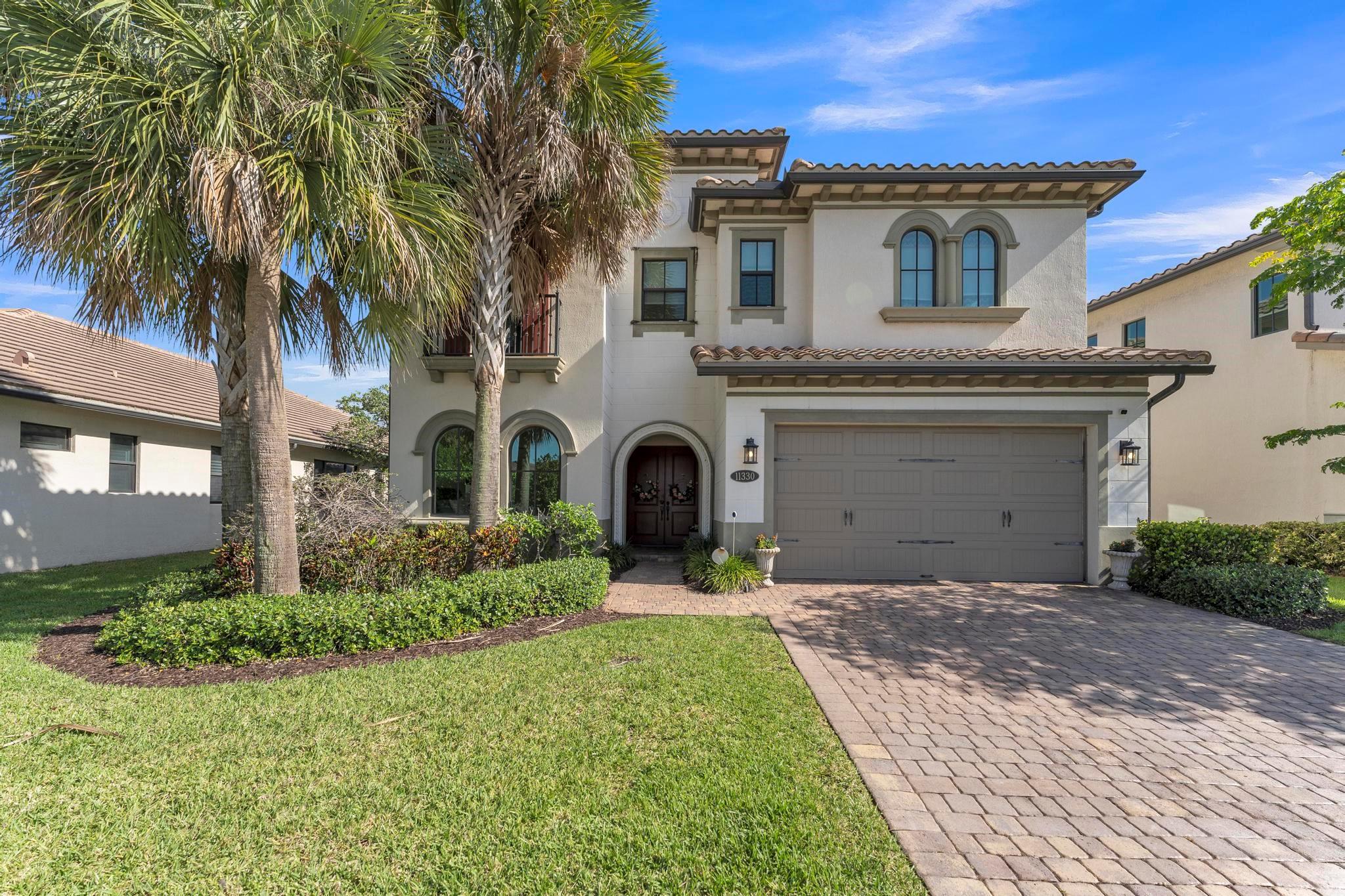 Live the South Florida lifestyle in this stunning lakefront estate—the largest model in Pembroke Pines’ exclusive Raintree community. This elegant 5-bed, 4.5-bath residence features soaring ceilings, a bonus upstairs den, & rare expansive 3-car garage. From the upgraded hardwood staircase, impact windows & porcelain tile floors, every detail exudes quality. The beautiful gourmet kitchen boasts an oversized island, induction stove & top-of-the-line stainless-steel appliances. The luxurious primary suite includes French doors, dual walk-in closets, and spa-inspired finishes. Entertain guests & relax poolside in your private retreat w/ serene lake views & AstroTurf yard. Raintree is an immaculate gated community w/ 24-hour security, a community pool, fitness center and clubhouse facilities.