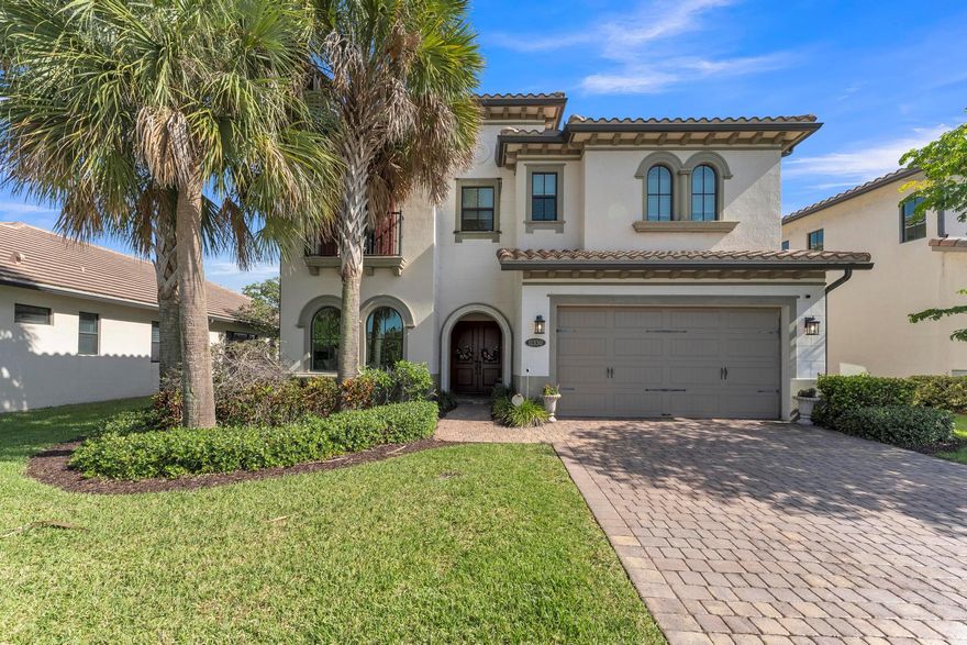 Live the South Florida lifestyle in this stunning lakefront estate—the largest model in Pembroke Pines’ exclusive Raintree community. This elegant 5-bed, 4.5-bath residence features soaring ceilings, a bonus upstairs den, & rare expansive 3-car garage. From the upgraded hardwood staircase, impact windows & porcelain tile floors, every detail exudes quality. The beautiful gourmet kitchen boasts an oversized island, induction stove & top-of-the-line stainless-steel appliances. The luxurious primary suite includes French doors, dual walk-in closets, and spa-inspired finishes. Entertain guests & relax poolside in your private retreat w/ serene lake views & AstroTurf yard. Raintree is an immaculate gated community w/ 24-hour security, a community pool, fitness center and clubhouse facilities.
