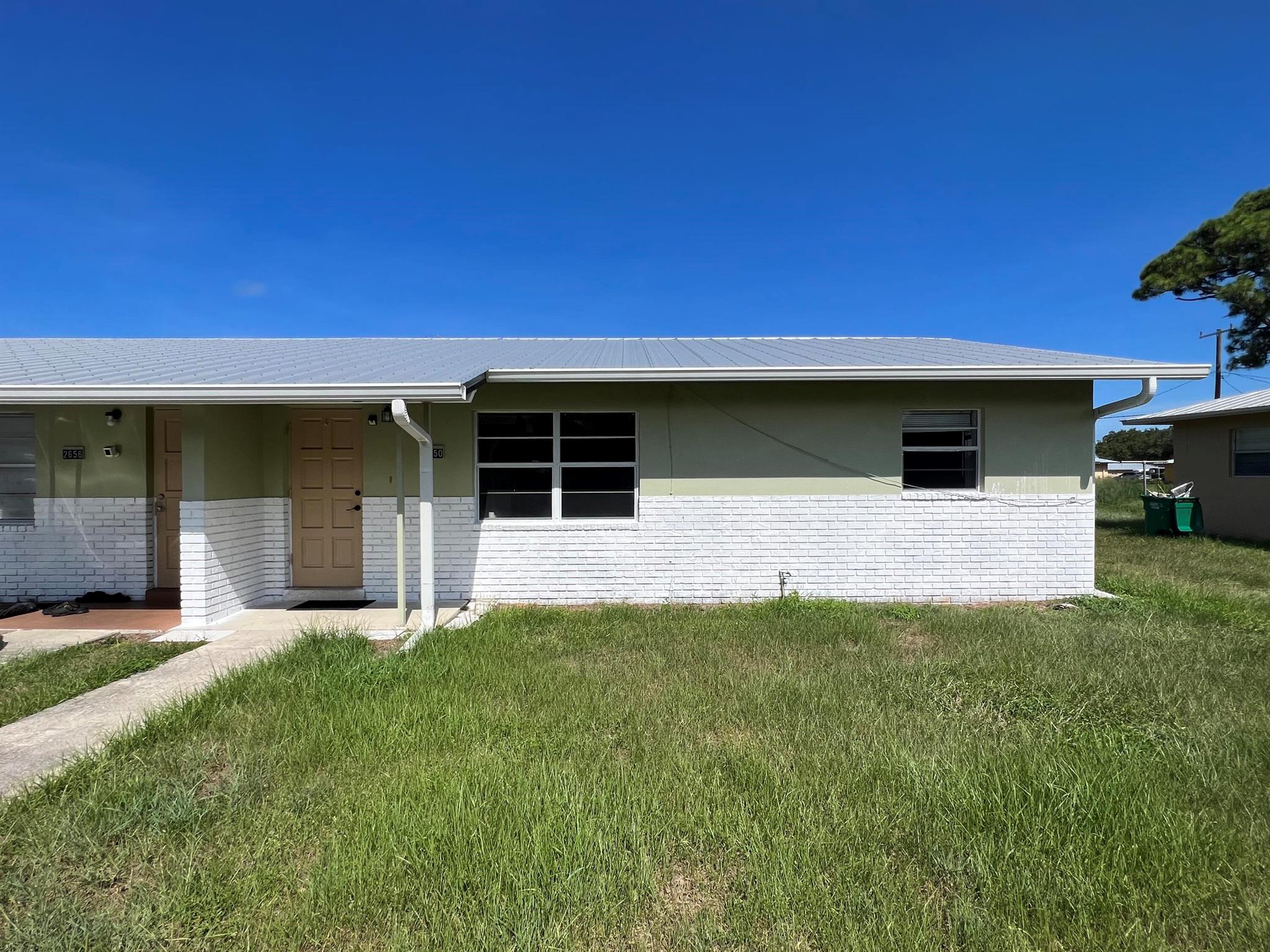 Spacious 2 bedroom 1 bath duplex with tile throughout and covered back patio. Updated Kitchen and Bathroom. Stainless appliances. $75 per adult credit and background application fee. Proof of verifiable Income 3x the rent. First , last and security. Tenant responsible for lawn.