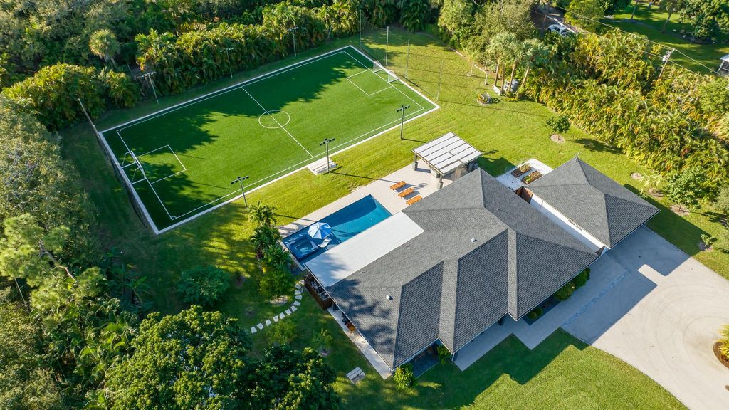 Photo of 7647 Lawrence Road, Boynton Beach, FL 33436 (MLS # R11115410)