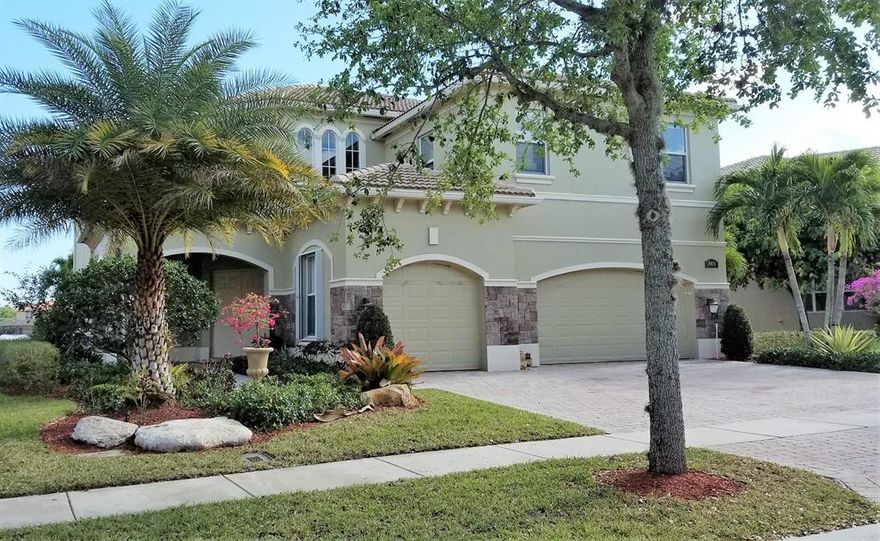 Exceptional floor plan, beautifully upgraded, freshly painted exterior, new landscape, impact windows up, accordion down, large marble floors, crown moldings. True 6 bedrooms, 4 full baths. oversized pool with southern exposure, LONG LAKE VIEWS. PRICED TO SELL FAST, CALL TODAY, WILL NOT LAST