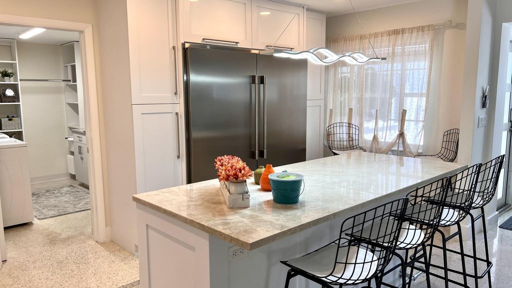 Photo of 464 NW 11th Street, Boca Raton, FL 33432 (MLS # B26021446)