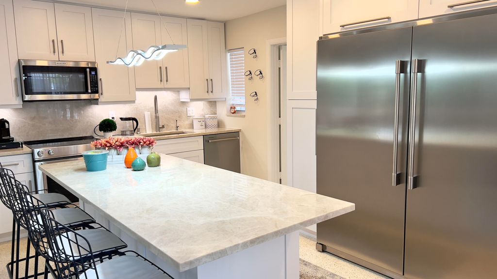 Photo of 464 NW 11th Street, Boca Raton, FL 33432 (MLS # B26021446)