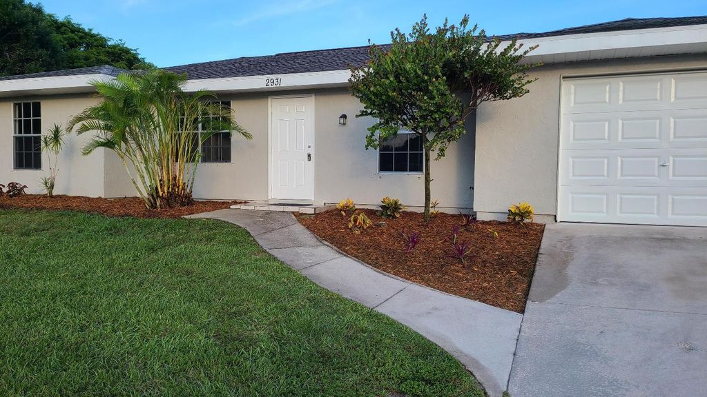 Photo of 2931 SW Birtle Court, Port Saint Lucie, FL 34953 (MLS # R11021059)
