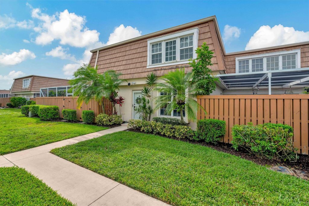 Photo of 11559 Winchester Drive #32 D, Palm Beach Gardens, FL 33410 (MLS # R11010815)