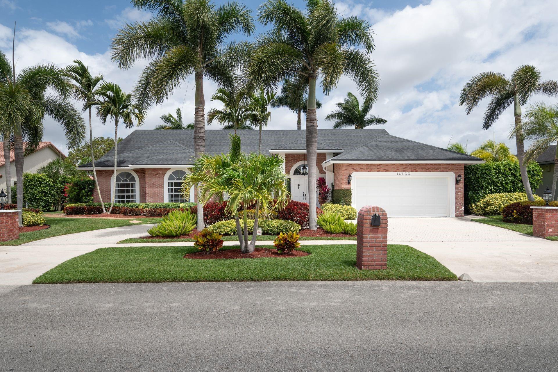 Nestled in the heart of Bonaventure in Weston, this exquisite home offers a perfect blend of elegance and comfort. 3 bedrooms + Den with 3 full baths. Impeccably renovated, it features a newer roof, soaring volume ceilings, and an abundance of natural light throughout. The garage has been thoughtfully converted into a gym. The split floor plan showcases luxurious marble and hardwood floors. The outdoor space is a true oasis, with a covered patio, sparkling pool, and a summer kitchen. A rare gem in a coveted location, within walking distance to the Bonaventure Town Center Club and offering access to great schools.