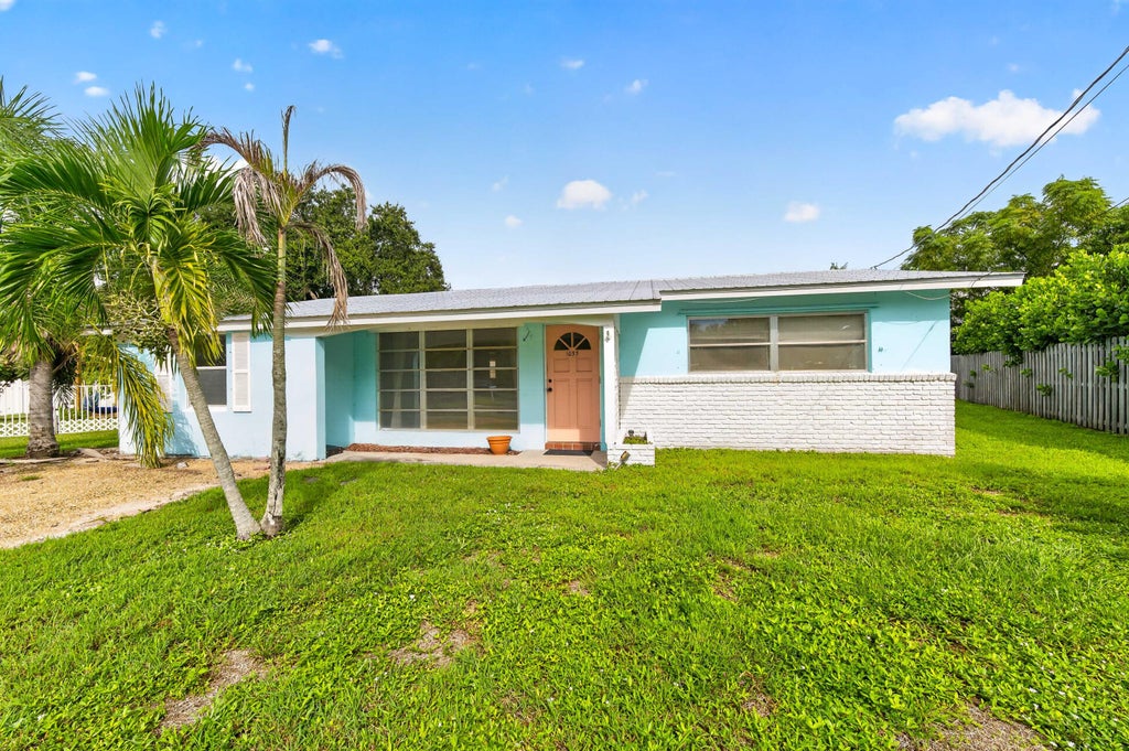 Photo of 1053 NW TERRACE Road, Stuart, FL 34994 (MLS # B26085828)