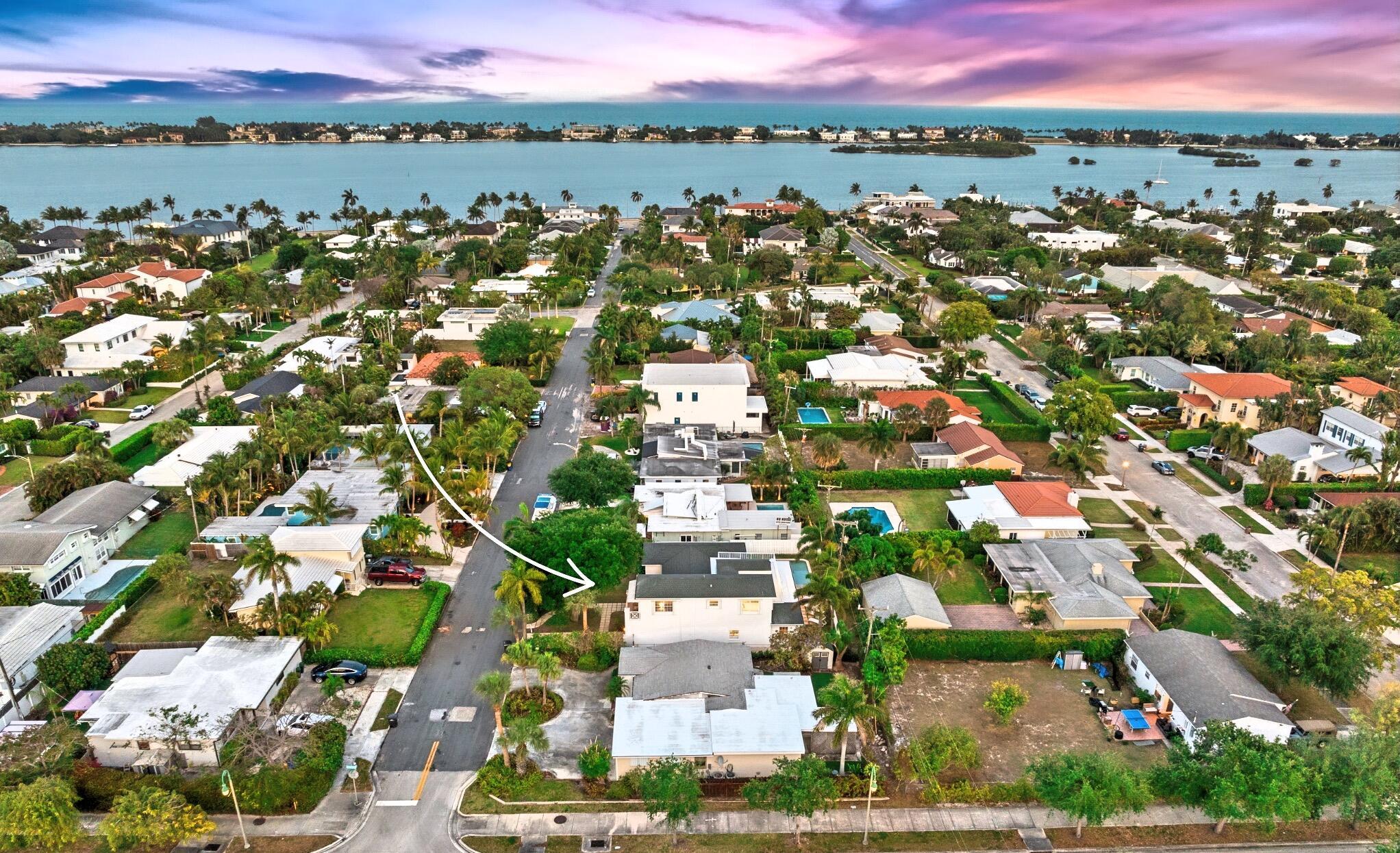 Located in the sought-after SoSo neighborhood, 240 Santa Lucia Drive offers 2,925 square feet of thoughtfully renovated living space, blending transitional coastal design with modern comfort. This 4-bedroom, 3-bathroom residence includes a dedicated private office and a split-bedroom layout for privacy and functionality. The home's 2022 renovation brought in high-end finishes throughout, including wide-format wood-look porcelain tile, a chef's kitchen with GE Cafe appliances, a wine fridge, white and brushed gold cabinetry, and marble countertops. The open-concept design seamlessly connects the indoor living areas to multiple outdoor spaces, including a covered patio, a pool deck, and a rooftop terrace accessed from the upstairs primary suite.