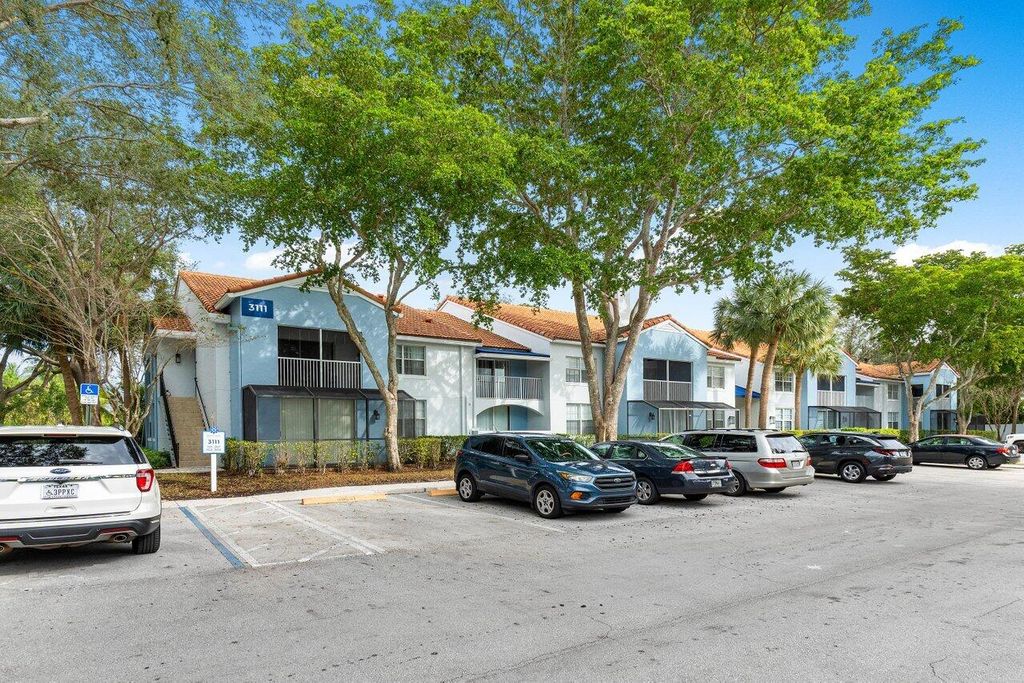 Photo of 3111 Clint Moore Road, Boca Raton, FL 33496 (MLS # B26027216)
