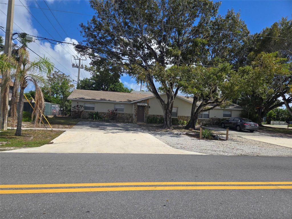 Photo of 296 Alemeda Drive, Palm Springs, FL 33461 (MLS # F10556435)