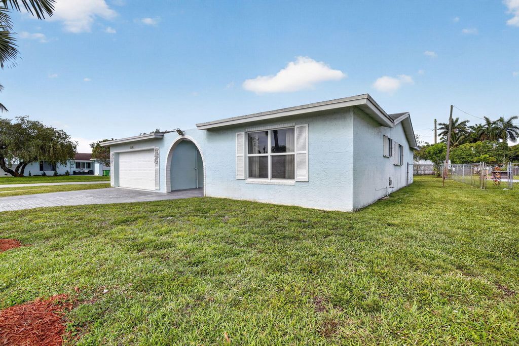 Photo of 2205 NW 72nd Avenue, Sunrise, FL 33313 (MLS # B26025619)