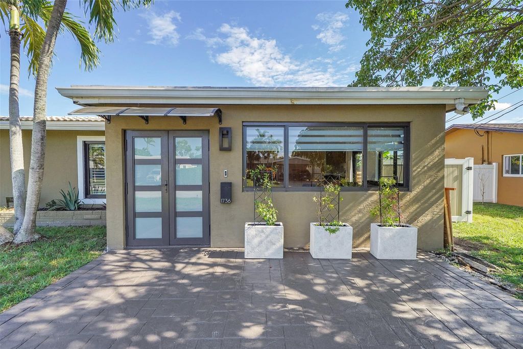 Photo of 1736 NW 38th St, Oakland Park, FL 33309 (MLS # F10516376)