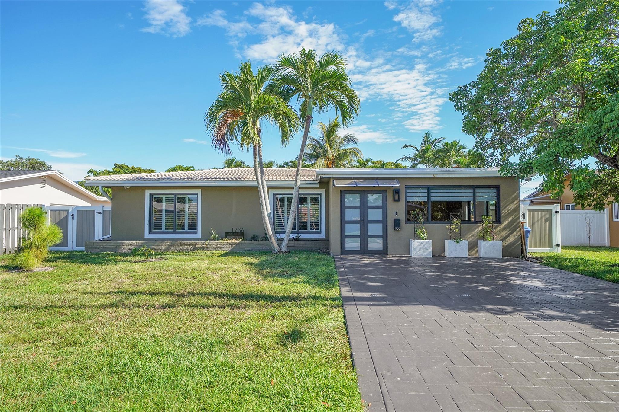 Welcome to your private retreat in the hidden gem of Royal Palm Isles. This spacious 3-bedroom, 2-bath waterfront pool home has everything you’ve been searching for. A versatile bonus room gives you the freedom to create the space you need, whether it’s a dedicated home office, guest room, gym, or hobby space. Step inside and enjoy bright, open living areas perfect for everyday comfort and effortless entertaining. Out back, unwind in your screened-in pool and patio with peaceful water views—an ideal setting for morning coffee or evening relaxation. Just minutes from Wilton Manors, the beach, and downtown Fort Lauderdale, and close to Easterlin Park and Royal Palm Park. Don’t miss your chance to make this home yours!