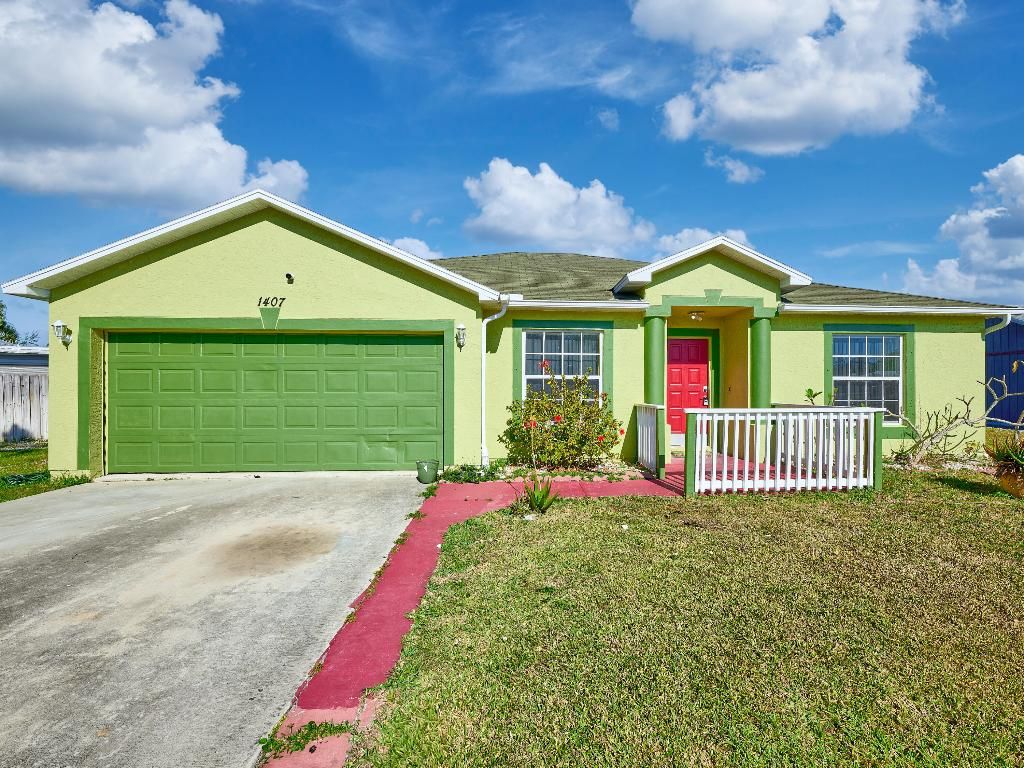 Photo of 1407 SE Grapeland Avenue, Port Saint Lucie, FL 34952 (MLS # R11146985)