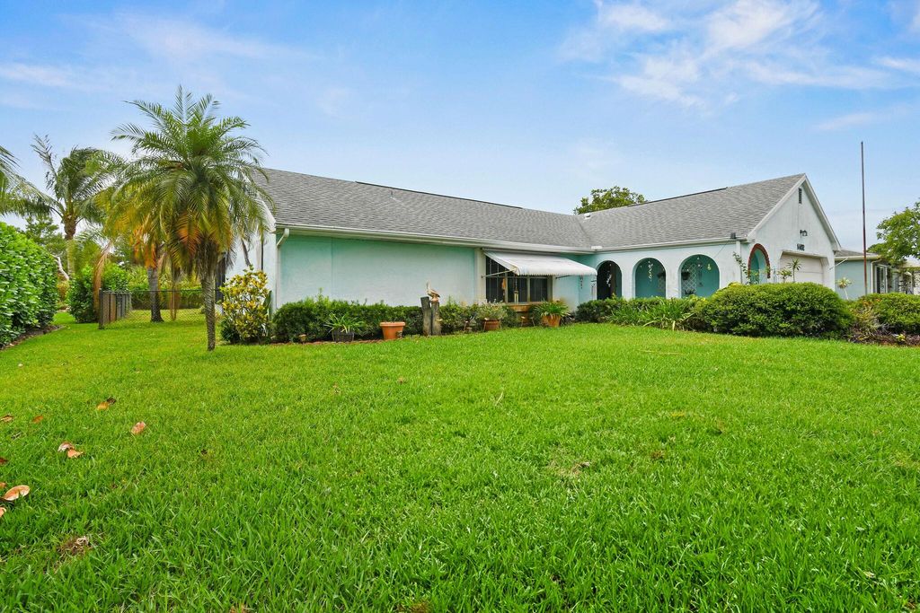 Photo of 1402 SE Buckingham Terrace, Port Saint Lucie, FL 34952 (MLS # R11090470)