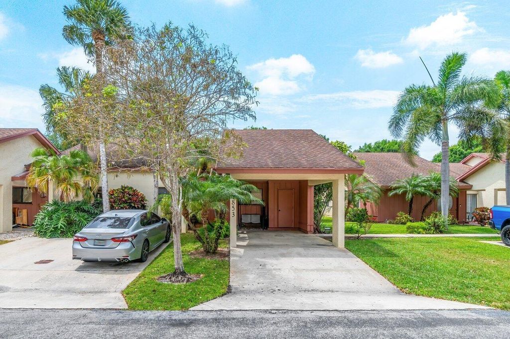 Photo of 1853 Tamarind Lane, Coconut Creek, FL 33063 (MLS # R10977931)