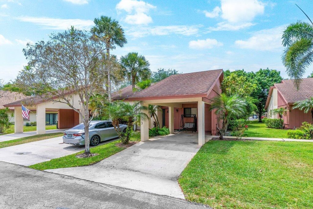 Photo of 1853 Tamarind Lane, Coconut Creek, FL 33063 (MLS # R10977931)