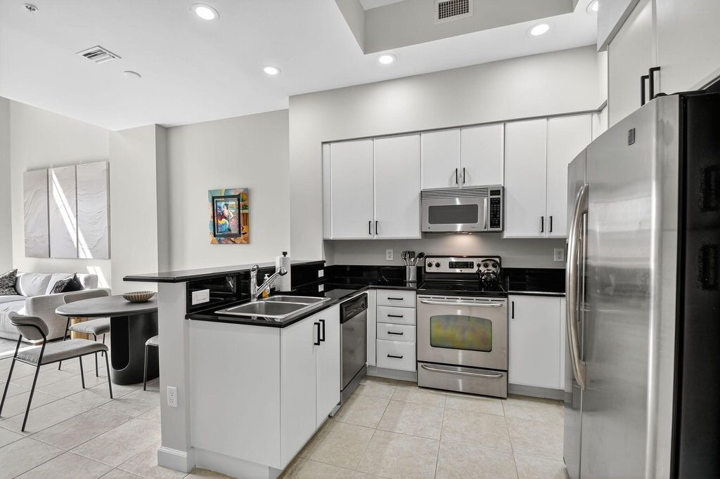 Photo of 801 S Olive Avenue #408, West Palm Beach, FL 33401 (MLS # R11130020)