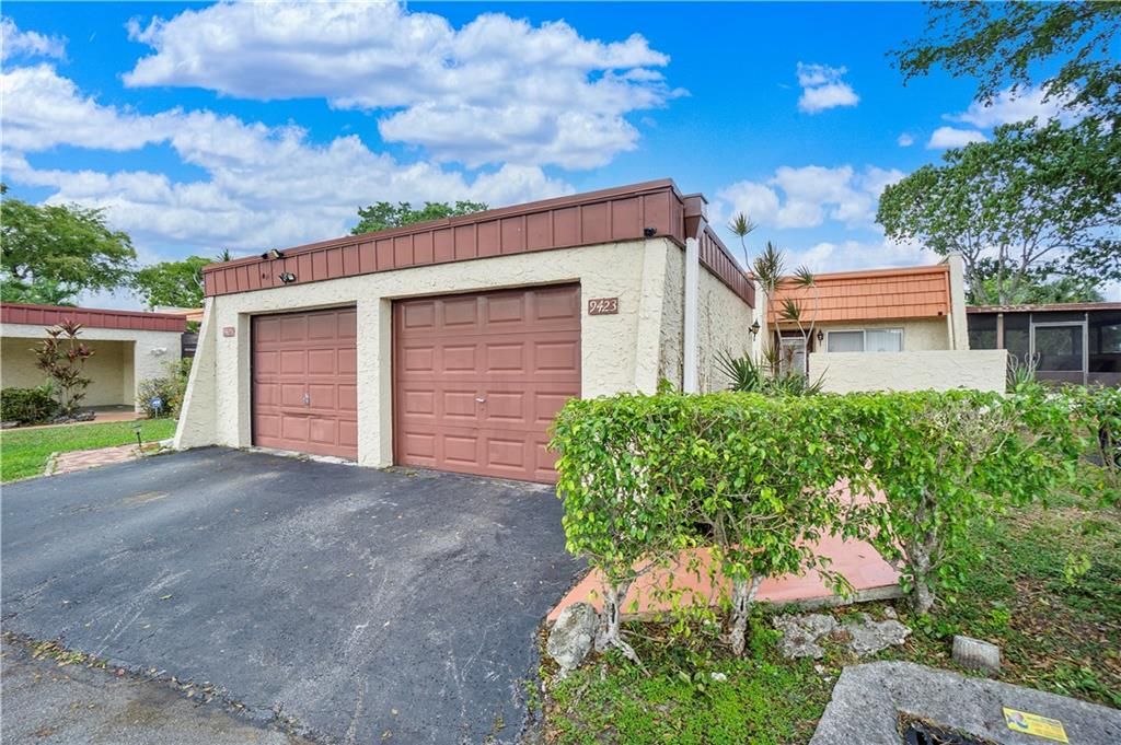 Photo of 9423 NW 65th St #E2, Tamarac, FL 33321 (MLS # F10328076)