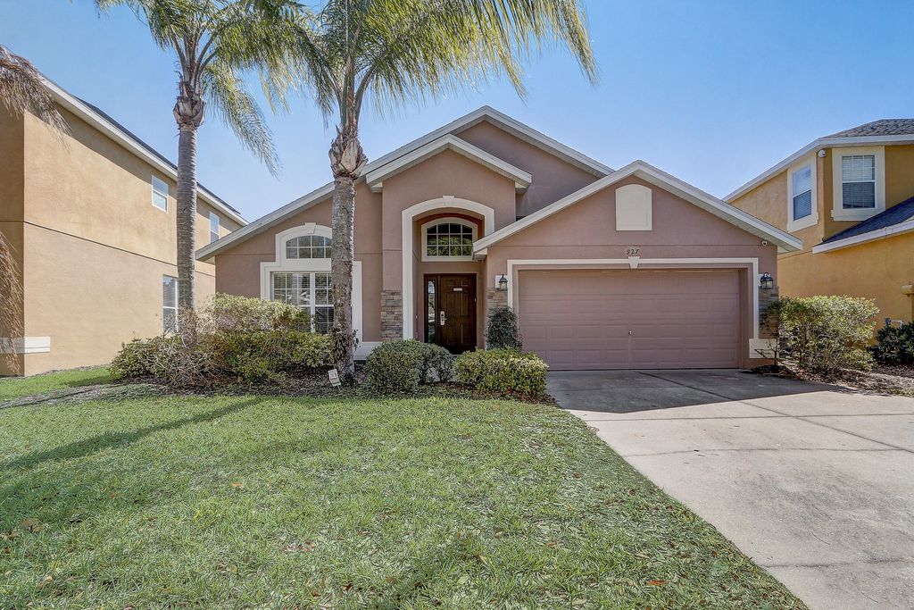 Photo of 927 Orange Cosmos Boulevard, Davenport, FL 33837 (MLS # R11131892)
