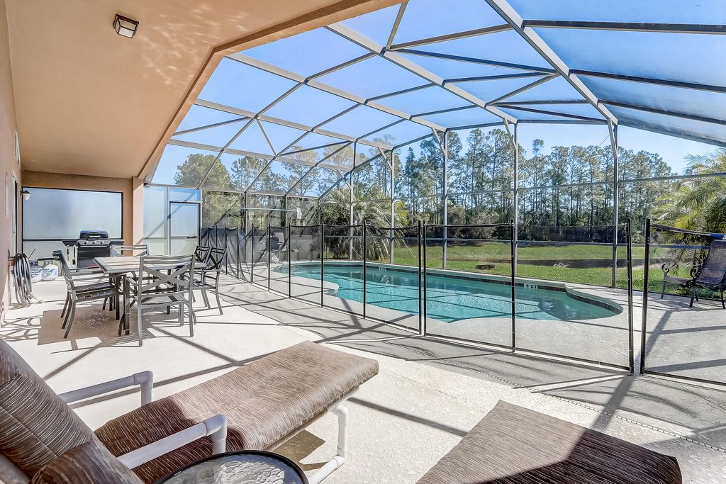 Photo of 927 Orange Cosmos Boulevard, Davenport, FL 33837 (MLS # R11131892)