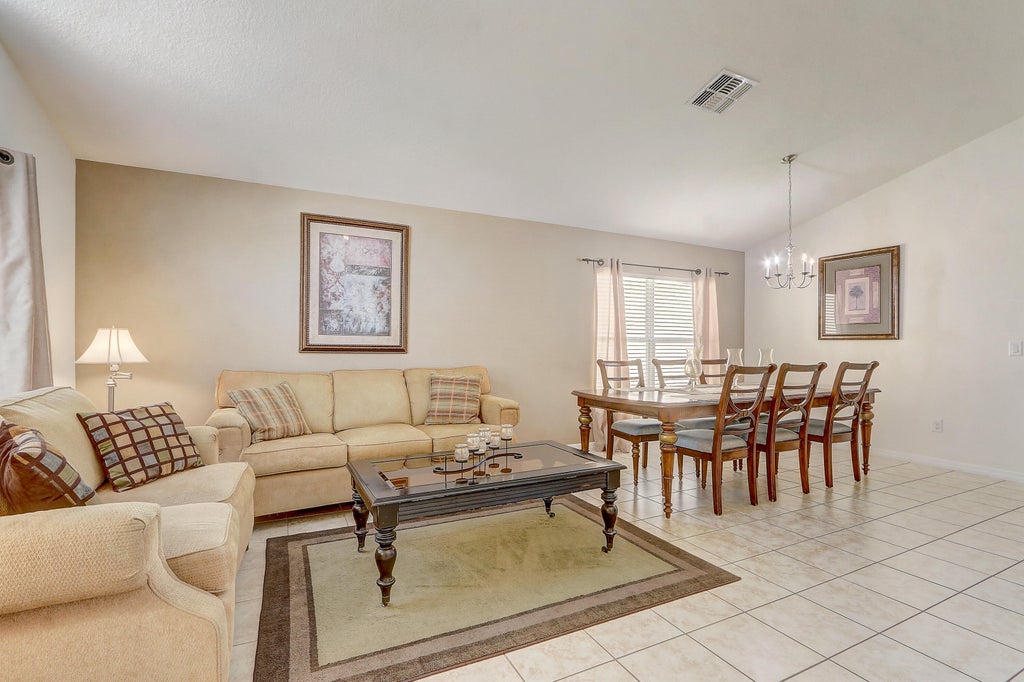 Photo of 927 Orange Cosmos Boulevard, Davenport, FL 33837 (MLS # R11131892)