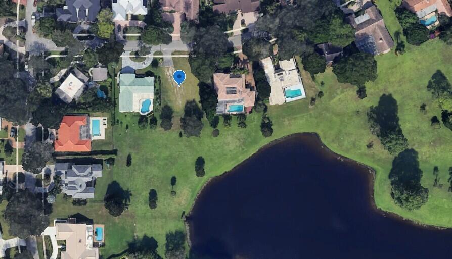 Prime Vacant Lot in Boca Bath & Tennis - A Rare Opportunity!This exceptional vacant lot is one of the finest in Boca Bath & Tennis, offering a serene setting with stunning views of expansive parkland and a picturesque lake. Nestled in one of Boca Raton's most sought-after family communities, this is a rare opportunity to build your dream home in a prestigious 24-hour guard-gated neighborhood.Lot is 150' x 100'. Boca Bath & Tennis is know for having the best location within Boca Raton. Minutes to I95, Town Center mall and a short 15 minute drive to the Beach. Gated community with HOA of only $693 month.Don't miss this chance to own one of the best lots in this premier community!