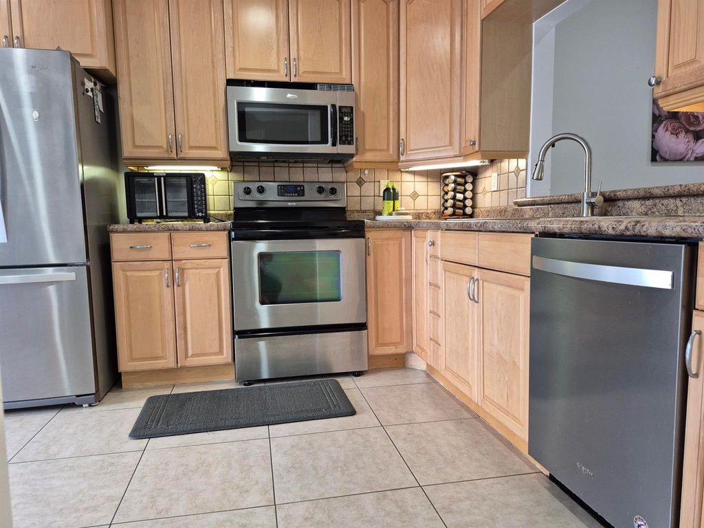 Photo of 4470 Lucerne Villas Lane, Lake Worth, FL 33467 (MLS # R11097272)