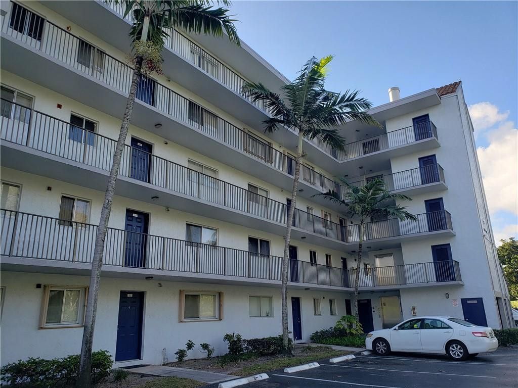 Photo of 8750 N Sherman Circle N #406, Miramar, FL 33025 (MLS # B26025543)