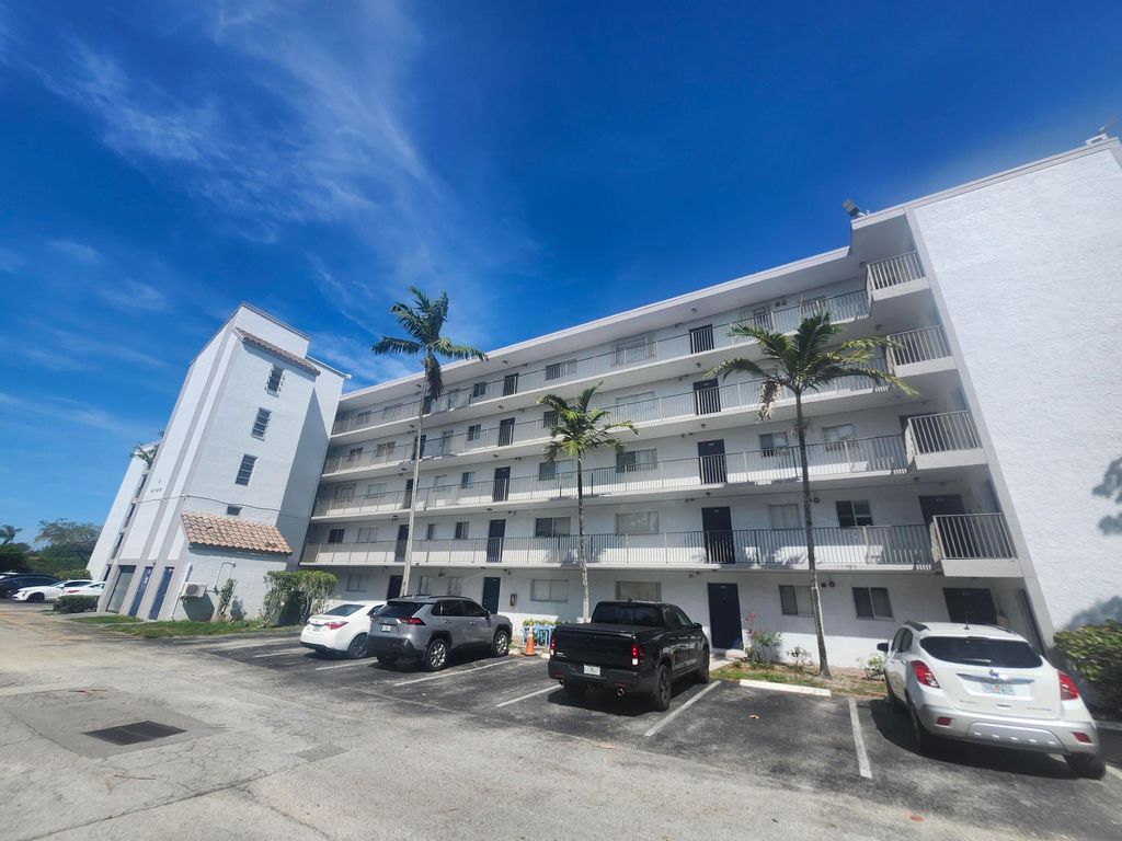 Photo of 8750 N Sherman Circle N #406, Miramar, FL 33025 (MLS # B26025543)