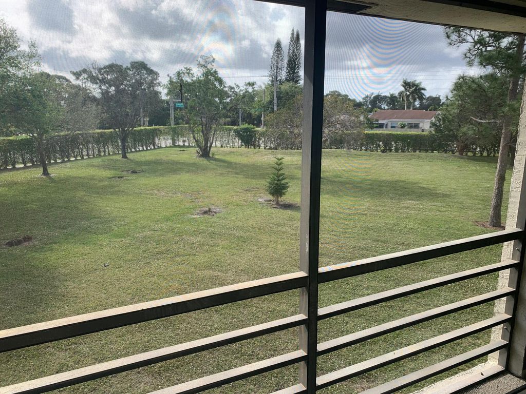 Photo of 4688 Oak Terrace Drive, Greenacres, FL 33463 (MLS # R11160905)