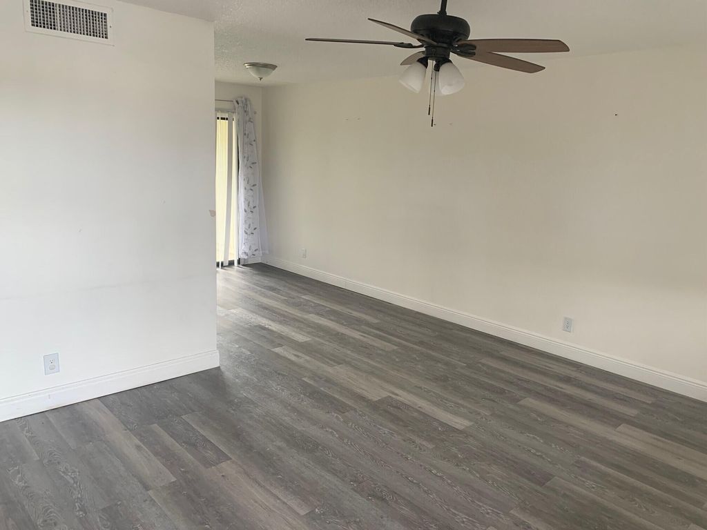 Photo of 4688 Oak Terrace Drive, Greenacres, FL 33463 (MLS # R11160905)