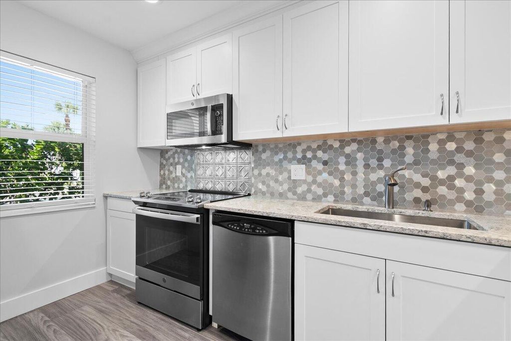 Photo of 178 Lake Susan Lane, West Palm Beach, FL 33411 (MLS # B26029962)