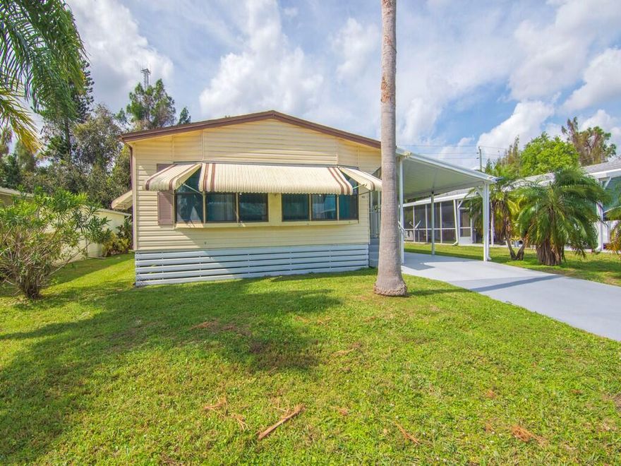 Discover comfortable living in this delightful 2-bedroom, 2-bathroom mobile home located in the highly desirable Spanish Lakes Golf Village, a 55+ active community in Port St. Lucie, FL. This home offers spacious interiors, a well-appointed kitchen, and a large screened-in porch—perfect for enjoying Florida's beautiful weather. Step into an inviting open floor plan creating a warm and welcoming atmosphere. The kitchen features ample cabinet space and a large pantry. The primary suite boasts an en-suite bathroom and a walk-in closet, providing comfort and privacy. Beyond the home, the community offers top-notch amenities, including golf, tennis, pickleball, clubhouse activities, swimming, and more—all designed for an engaging, active lifestyle.