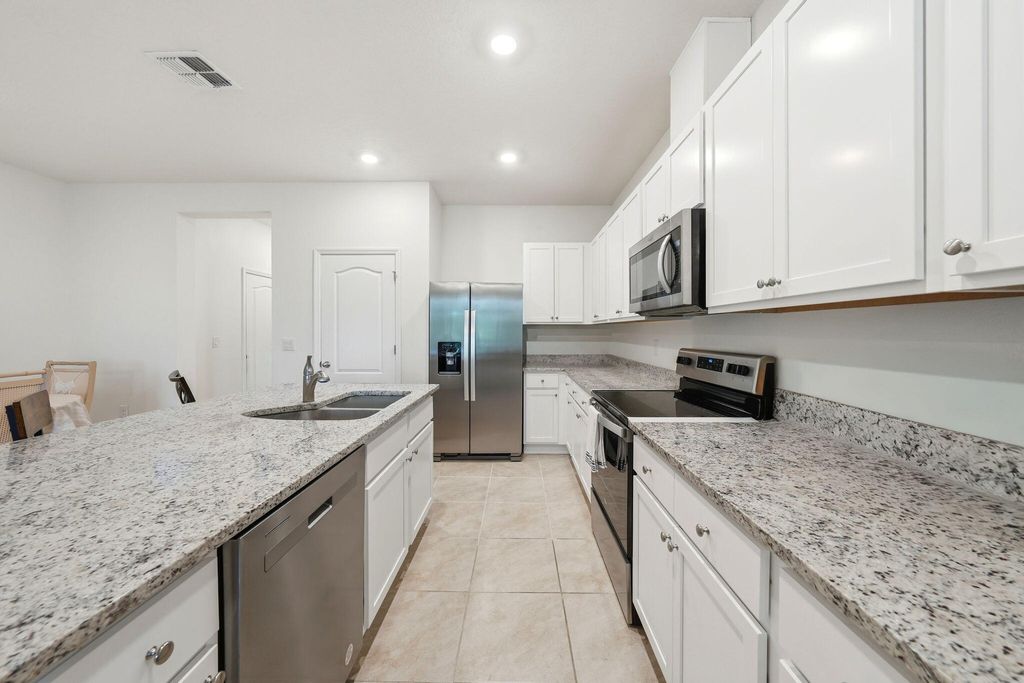 Photo of 986 Lido Drive, Howey in the Hills, FL 34737 (MLS # B26007288)